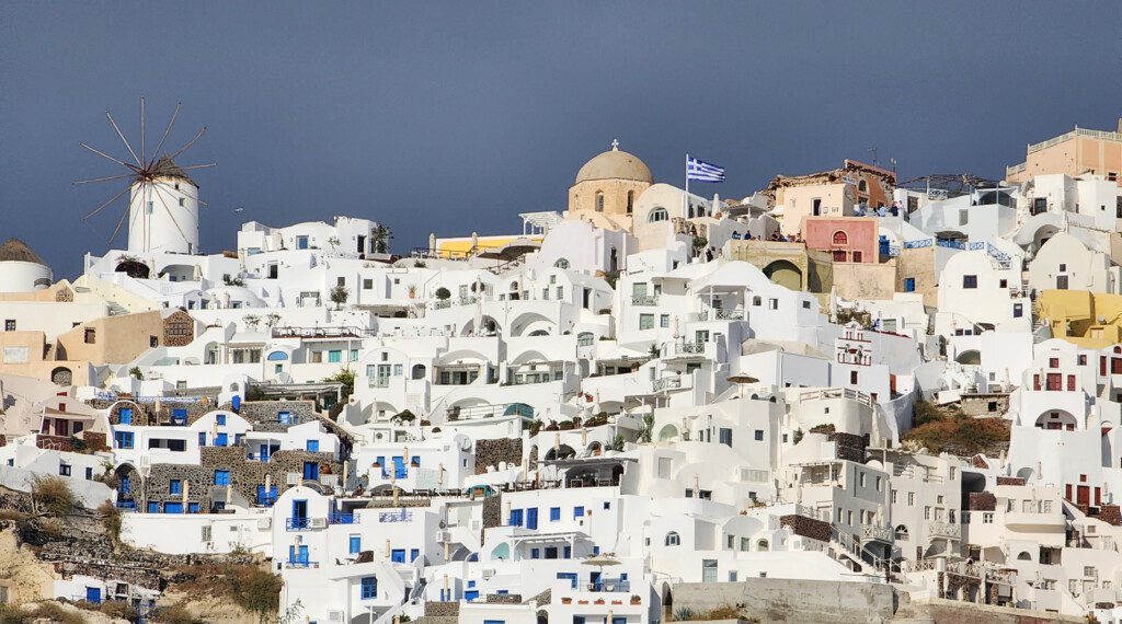 a white buildings on a hill