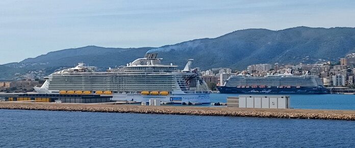 a cruise ship docked in a harbor
