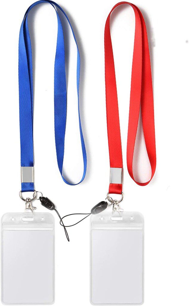 a group of lanyards with name tags