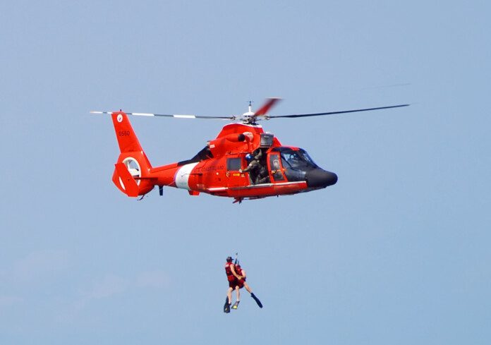 Fort Lauderdale, Florida - May 5, 2007: US Coast Guard crews conduct rescue operation at sea. The safety training event is part of the Air and Sea Show 2007.