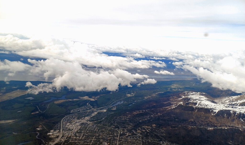 aerial view of a city and clouds