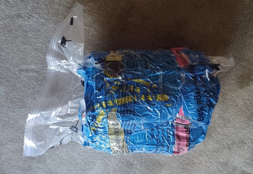 a plastic bag with blue and yellow text