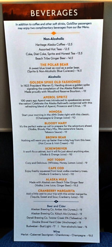a menu with orange and black text