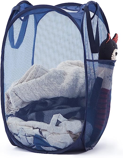 a blue laundry basket with a stuffed animal