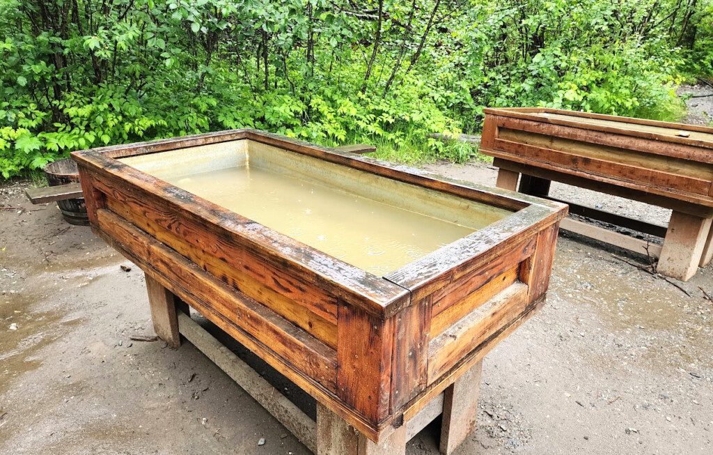 a wooden troughs with water in it