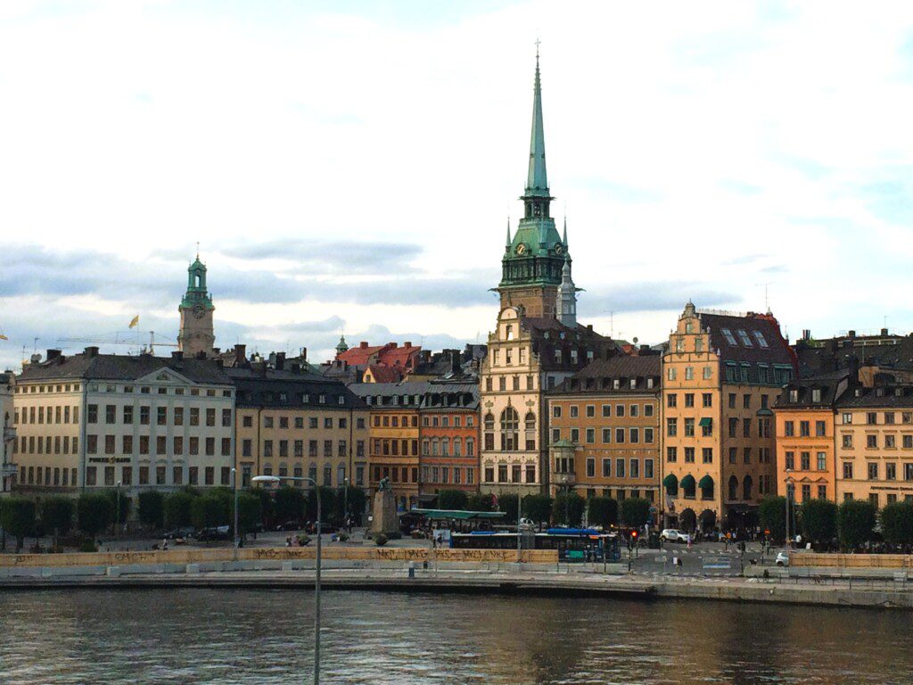 Christiansborg Palace with a river and a bridge