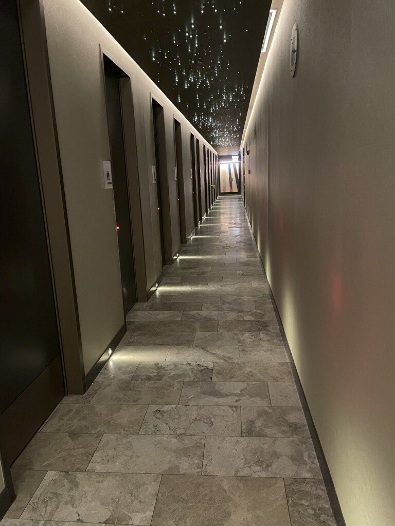 a hallway with several doors