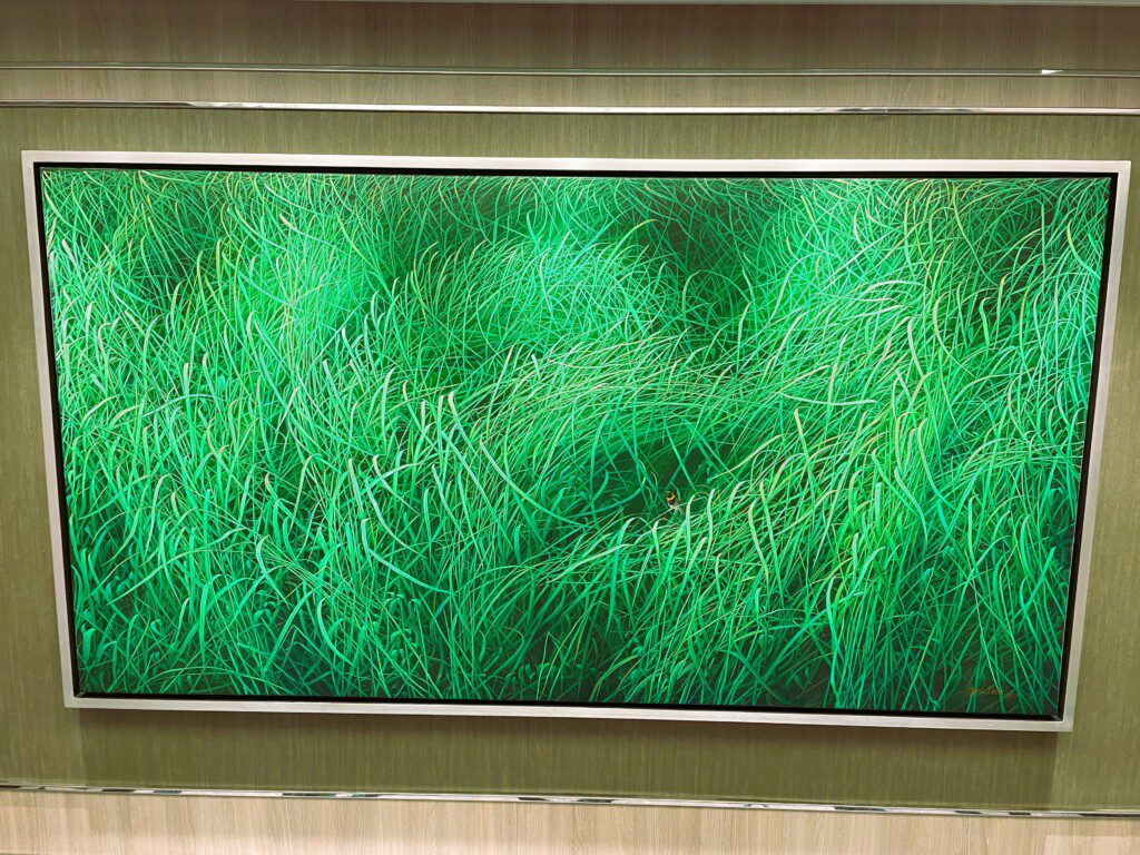 a green grass on a wall