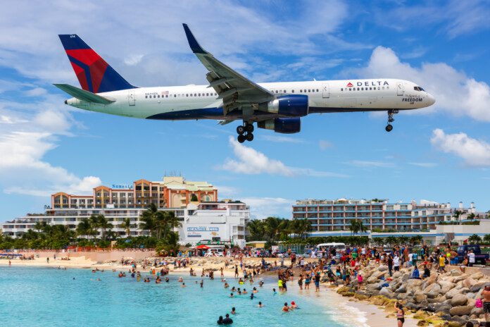 Sint Maarten, Netherlands Antilles - September 17, 2016: Delta Air Lines Boeing 757-200 airplane at Sint Maarten Airport (SXM) in the Caribbean. (©iStock.com/Boarding1Now)