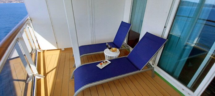 a lounge chairs on a deck