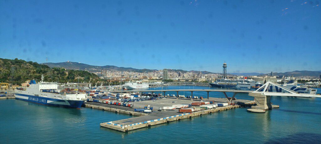 a port with many containers on the water