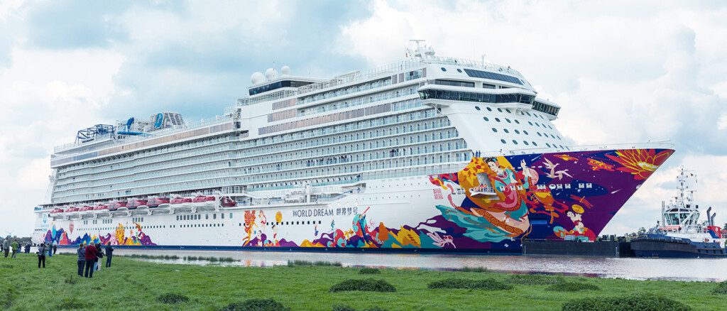 a large cruise ship with colorful designs on it