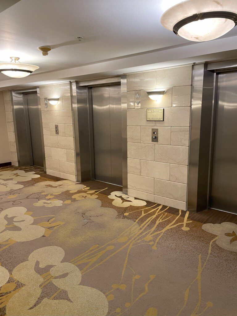 a group of elevators in a room