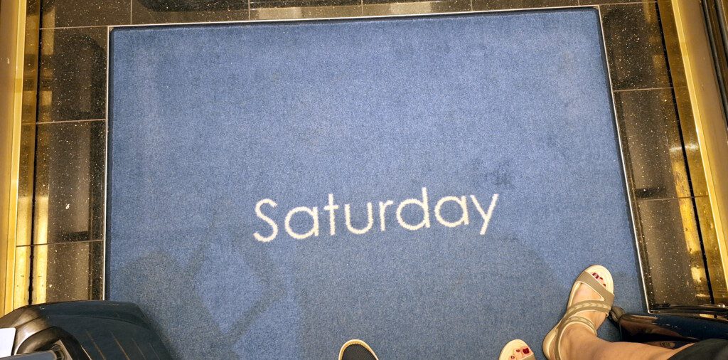 a blue carpet with white text on it