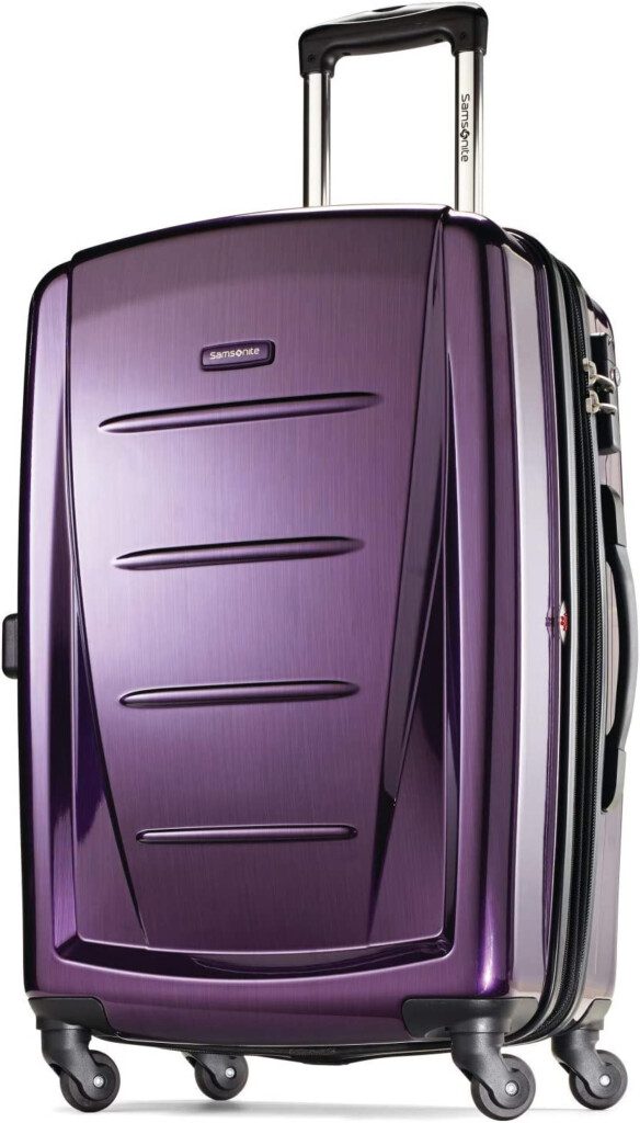 a purple suitcase with a white background