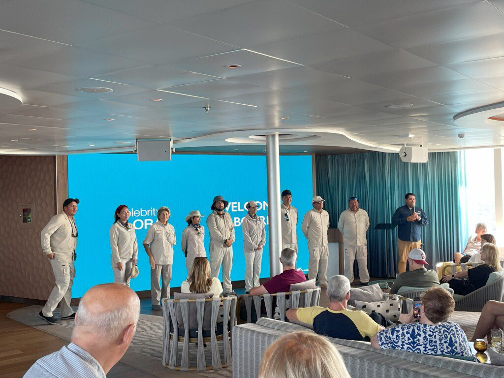 a group of people in white uniforms