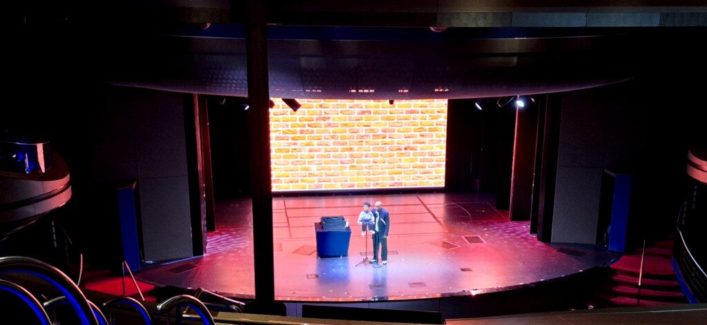 two men on a stage