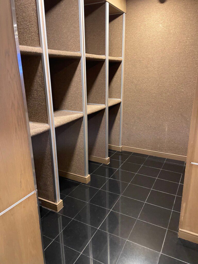a room with shelves and shelves