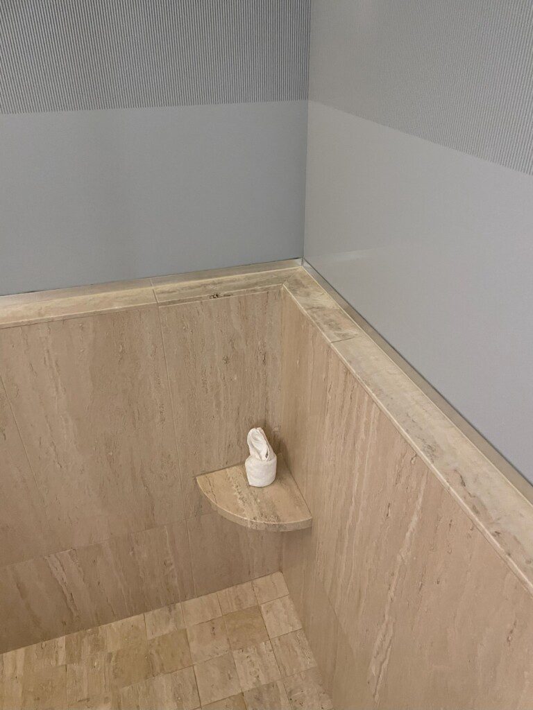 a toilet paper on a shelf
