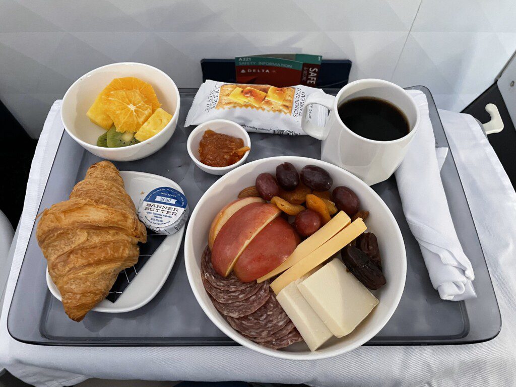 a tray with food and coffee