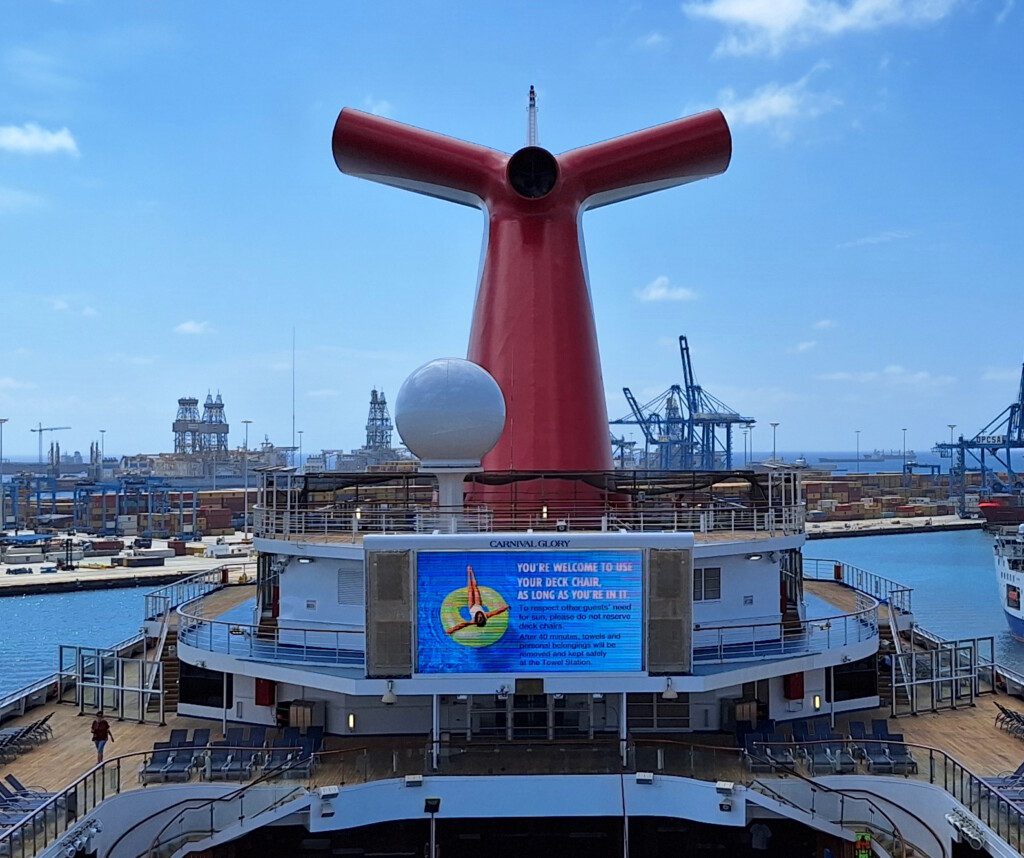 a large red and white object on a ship